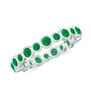 1 CT Emerald Uneven Eternity Ring in Bezel Setting
