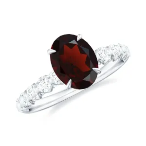8X6 MM Oval Cut Garnet Solitaire with Diamond Side Stones Ring