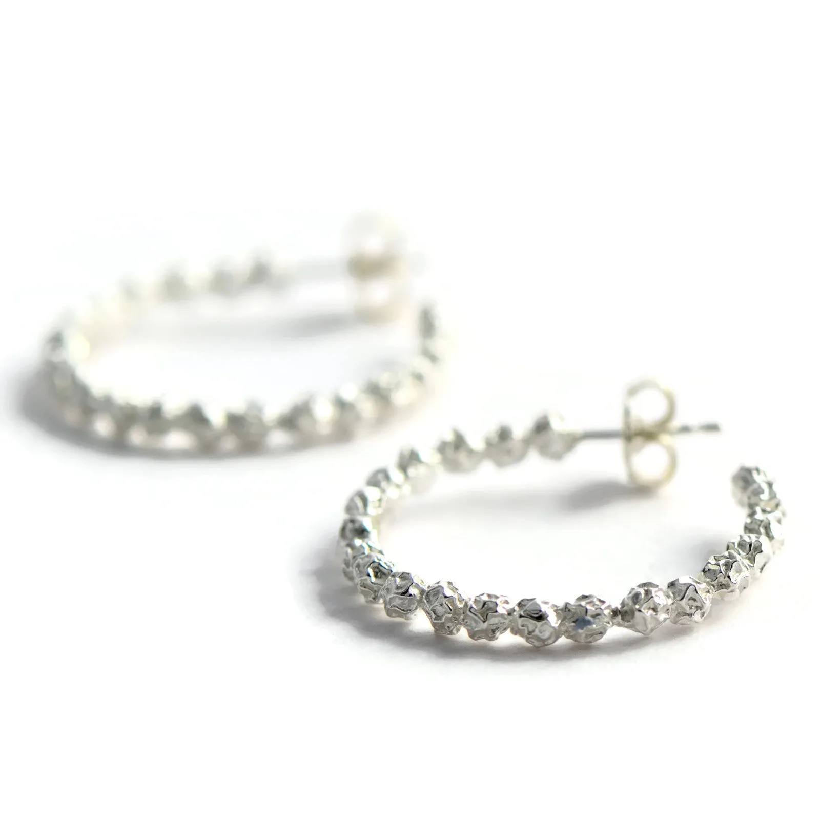 A Large silver peppercorns hoops earrings