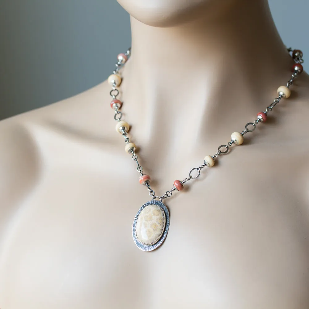 Agatized Fossil Coral Necklace, Pastel Floral Pattern Stone in Silver Bezel