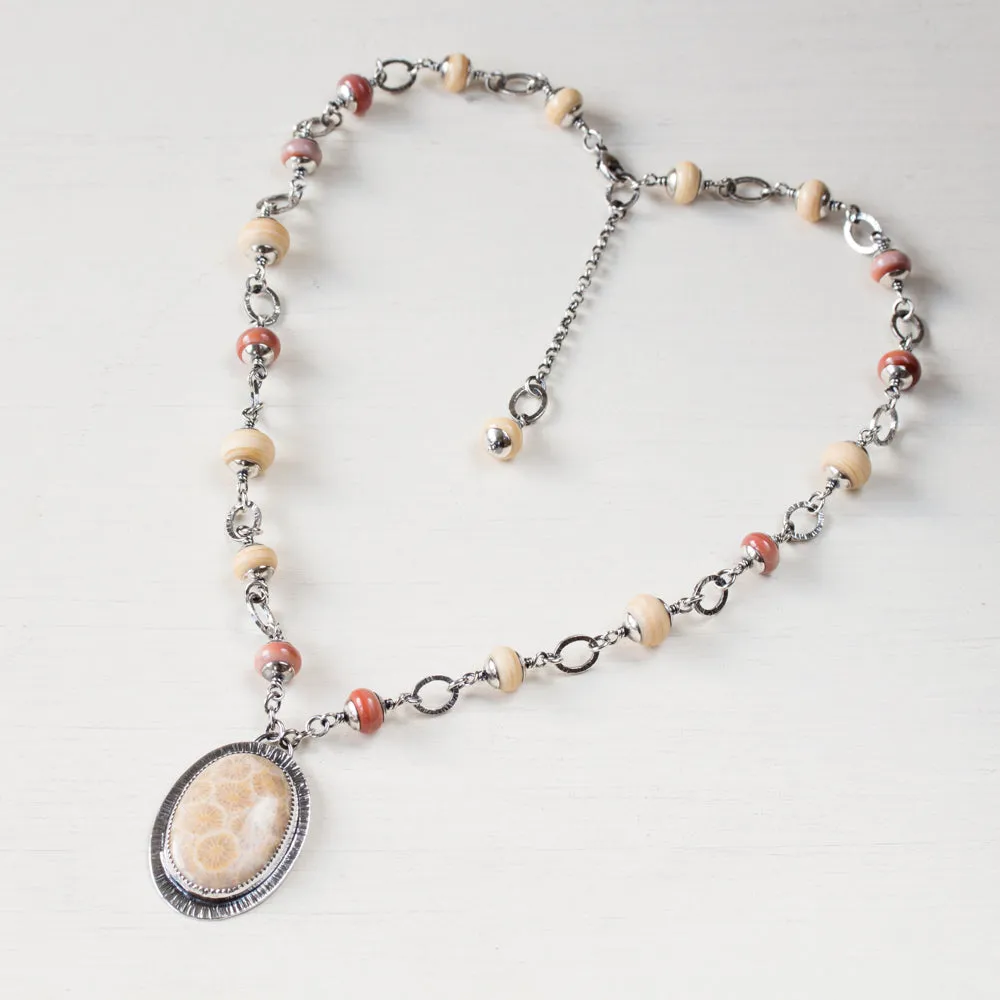 Agatized Fossil Coral Necklace, Pastel Floral Pattern Stone in Silver Bezel