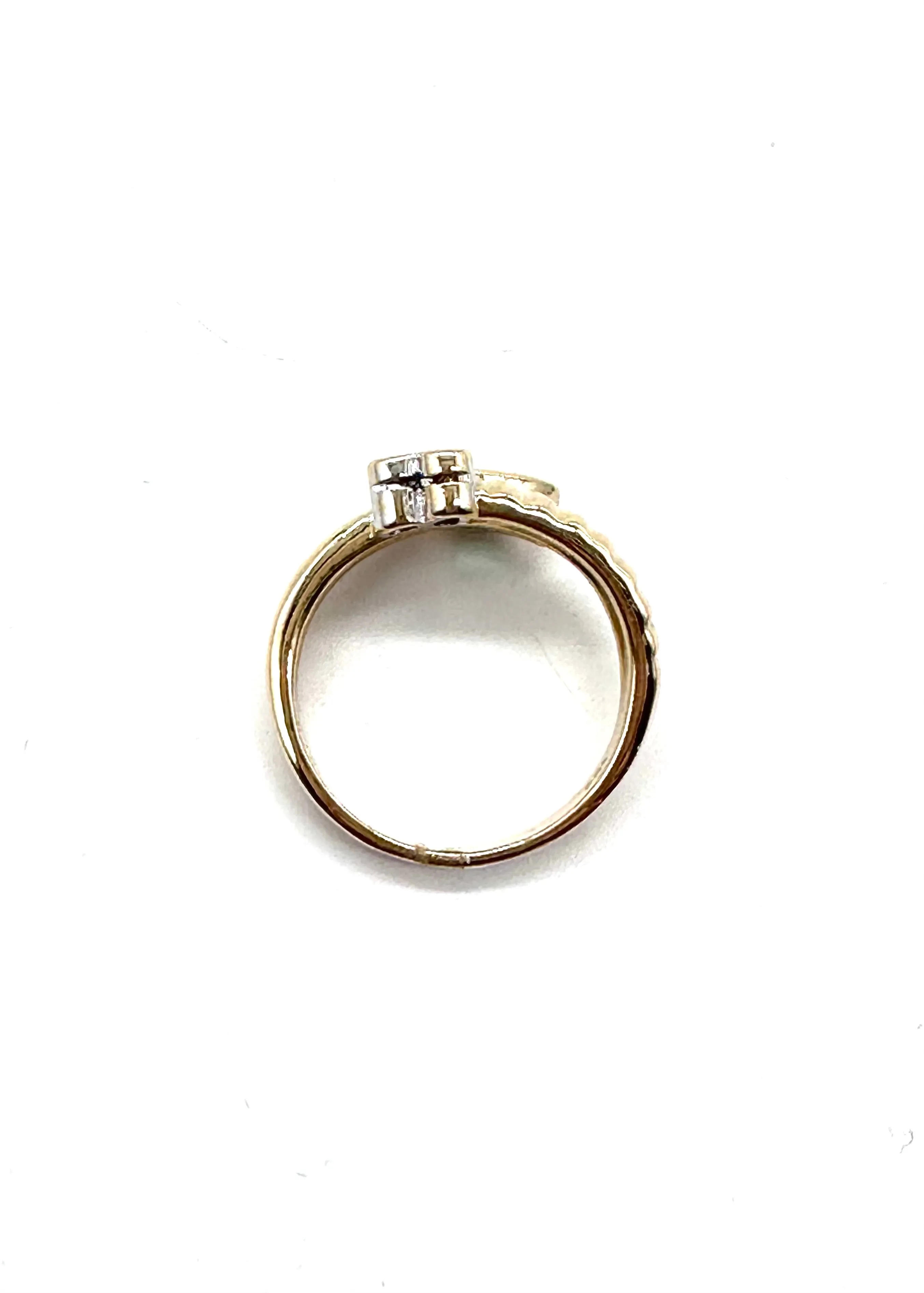 Emerald and diamond bypass ring
