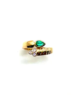 Emerald and diamond bypass ring