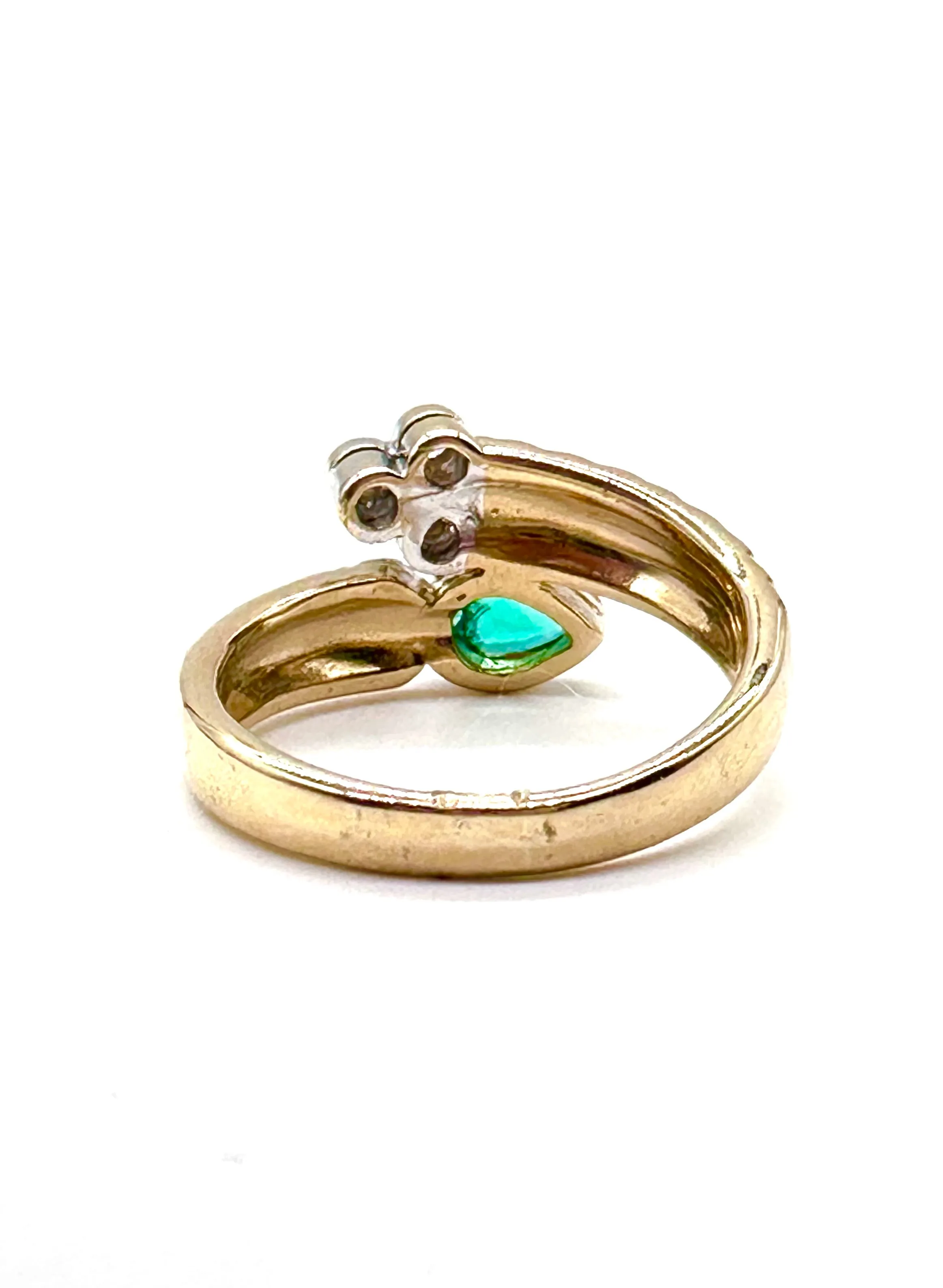 Emerald and diamond bypass ring