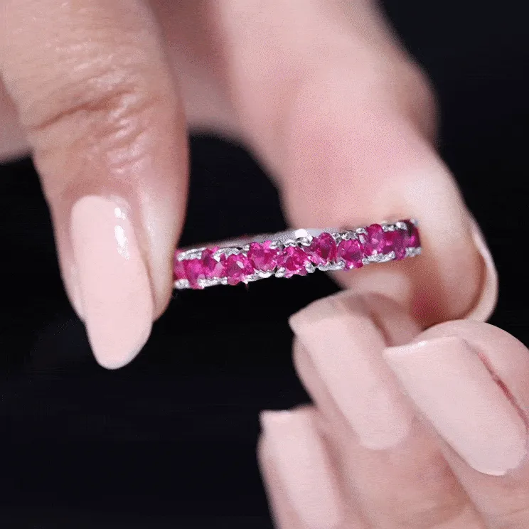 Heart Shape Lab Grown Pink Sapphire Eternity Ring in Claw Setting