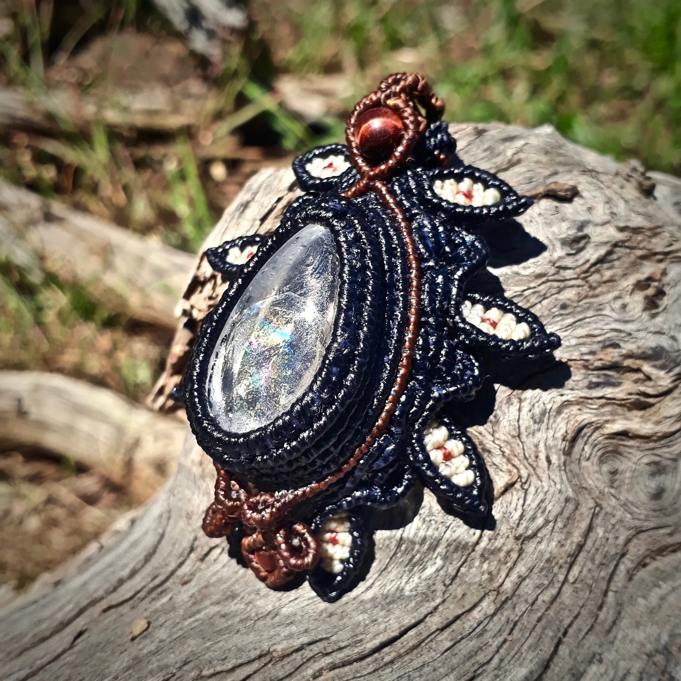 Negative quartz pendant