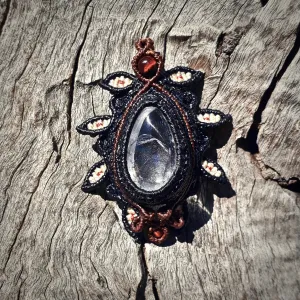 Negative quartz pendant
