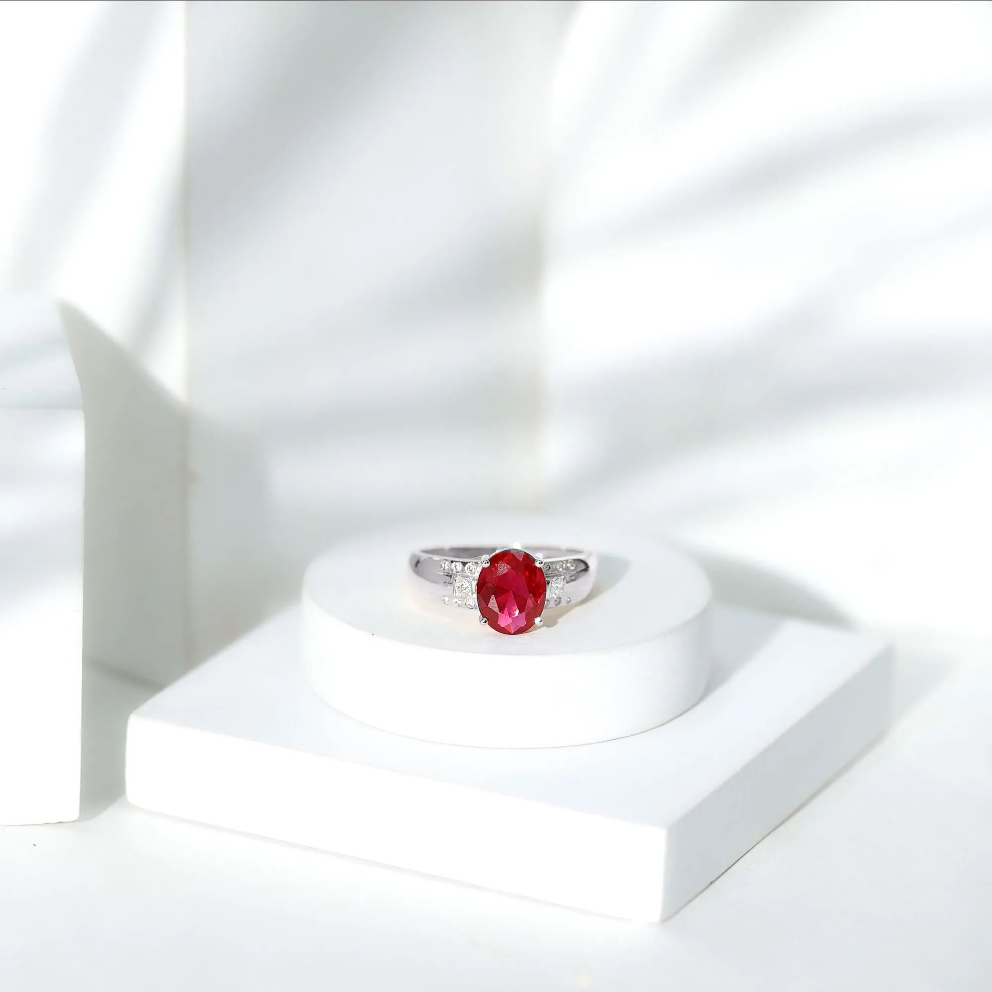 Oval Lab Grown Ruby Solitaire Statement Engagement Ring with Diamond