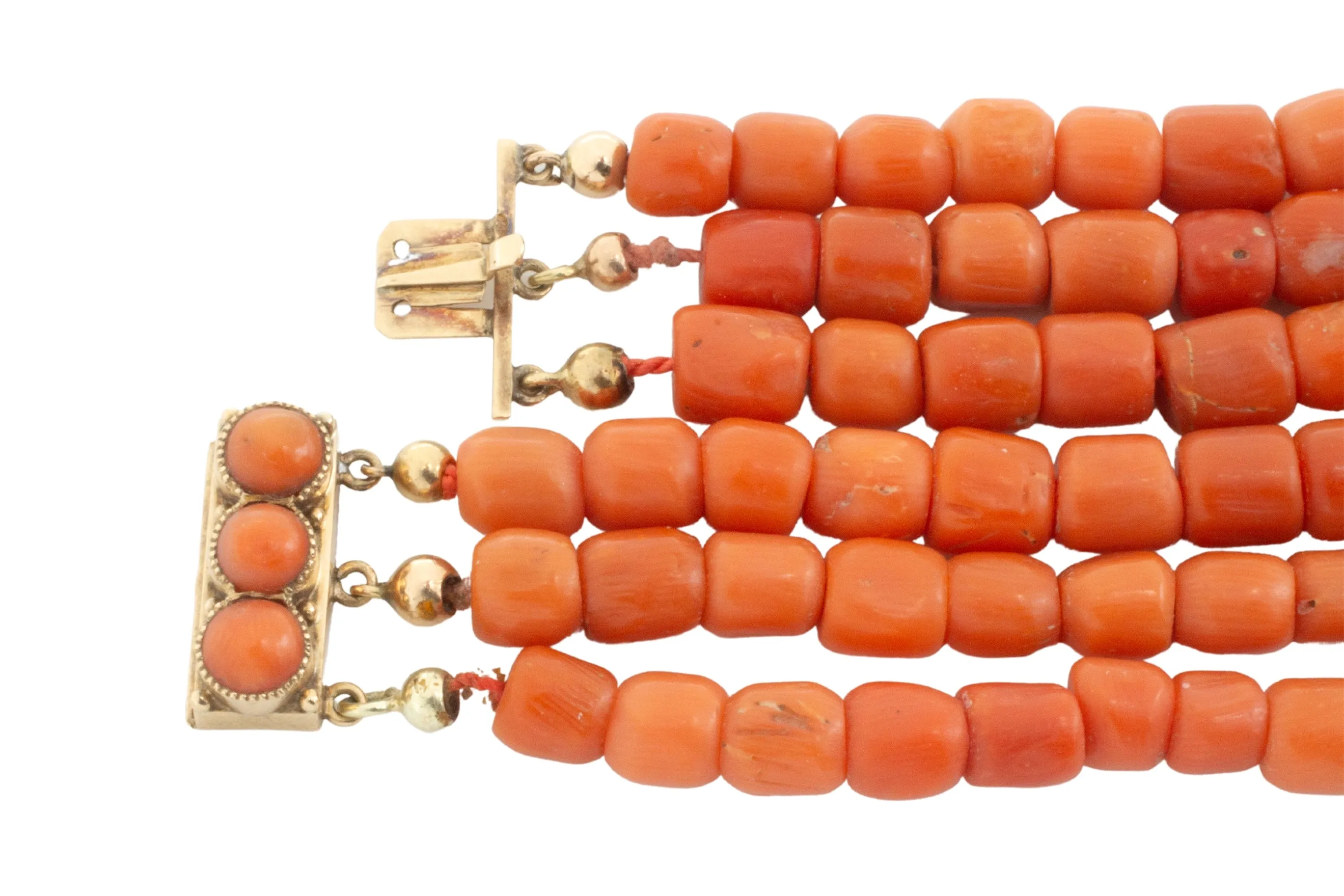 Three strand coral collier with 14 carat gold clasp