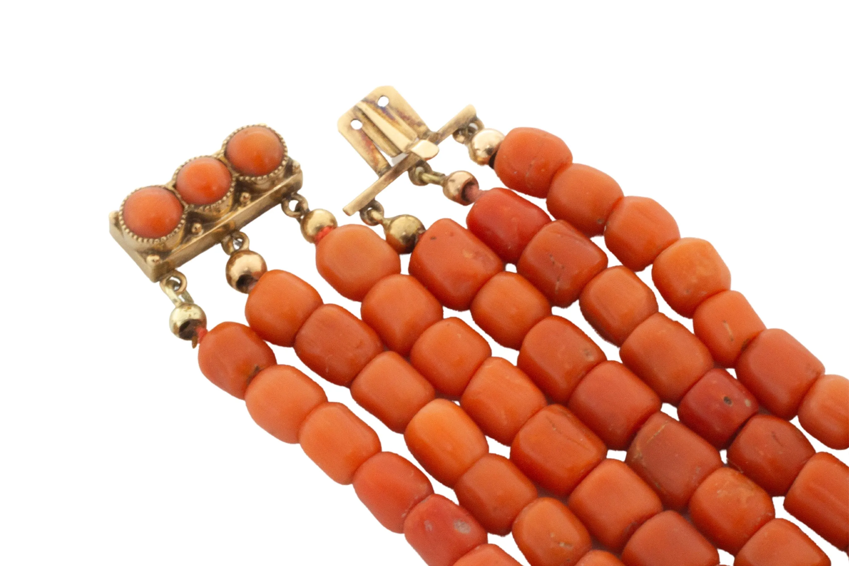 Three strand coral collier with 14 carat gold clasp